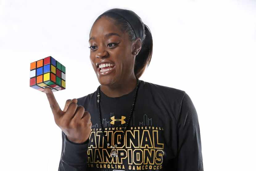 Dallas Wings guard Kaela Davis, who can solve a Rubik's Cube, is photographed at the home...