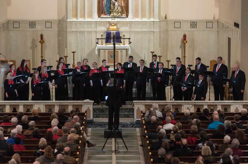 The Orpheus Chamber Singers performs its Christmas concert at St. Thomas Aquinas Catholic...