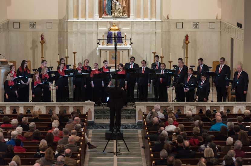 The Orpheus Chamber Singers performs its Christmas concert at St. Thomas Aquinas Catholic...