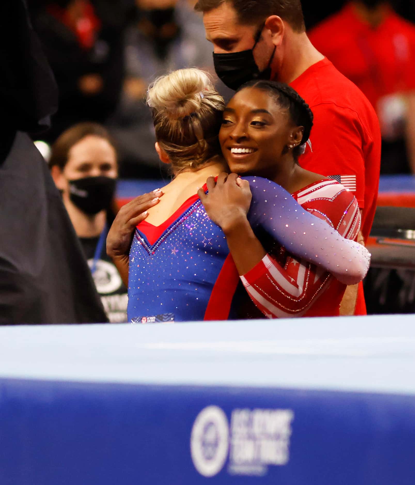 Simone Biles hugs MyKayla Skinner after completing her floor routine during day 2 of the...