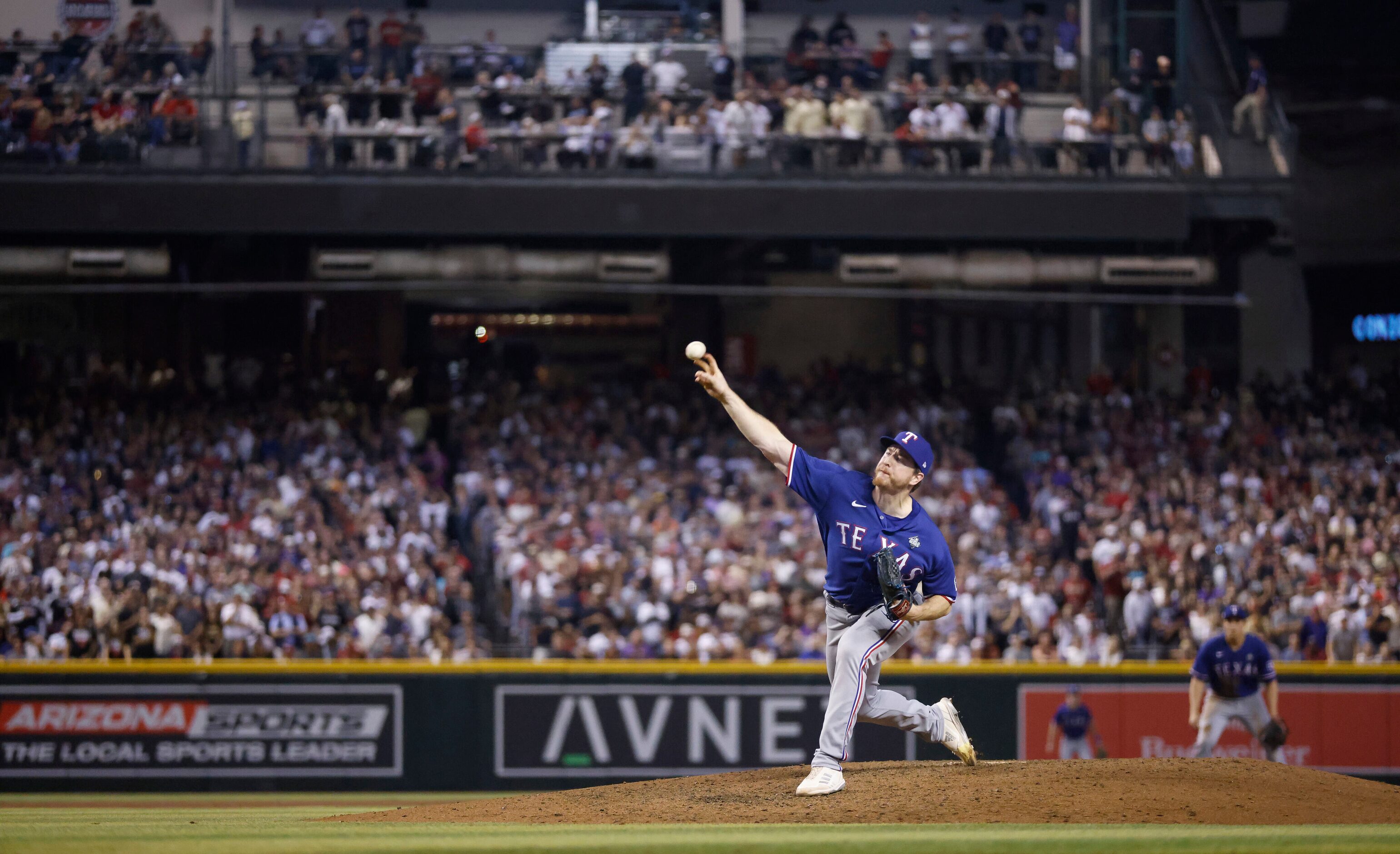 Texas Rangers relief pitcher Josh Sborz (66) throws during the eighth inning in Game 5 of...