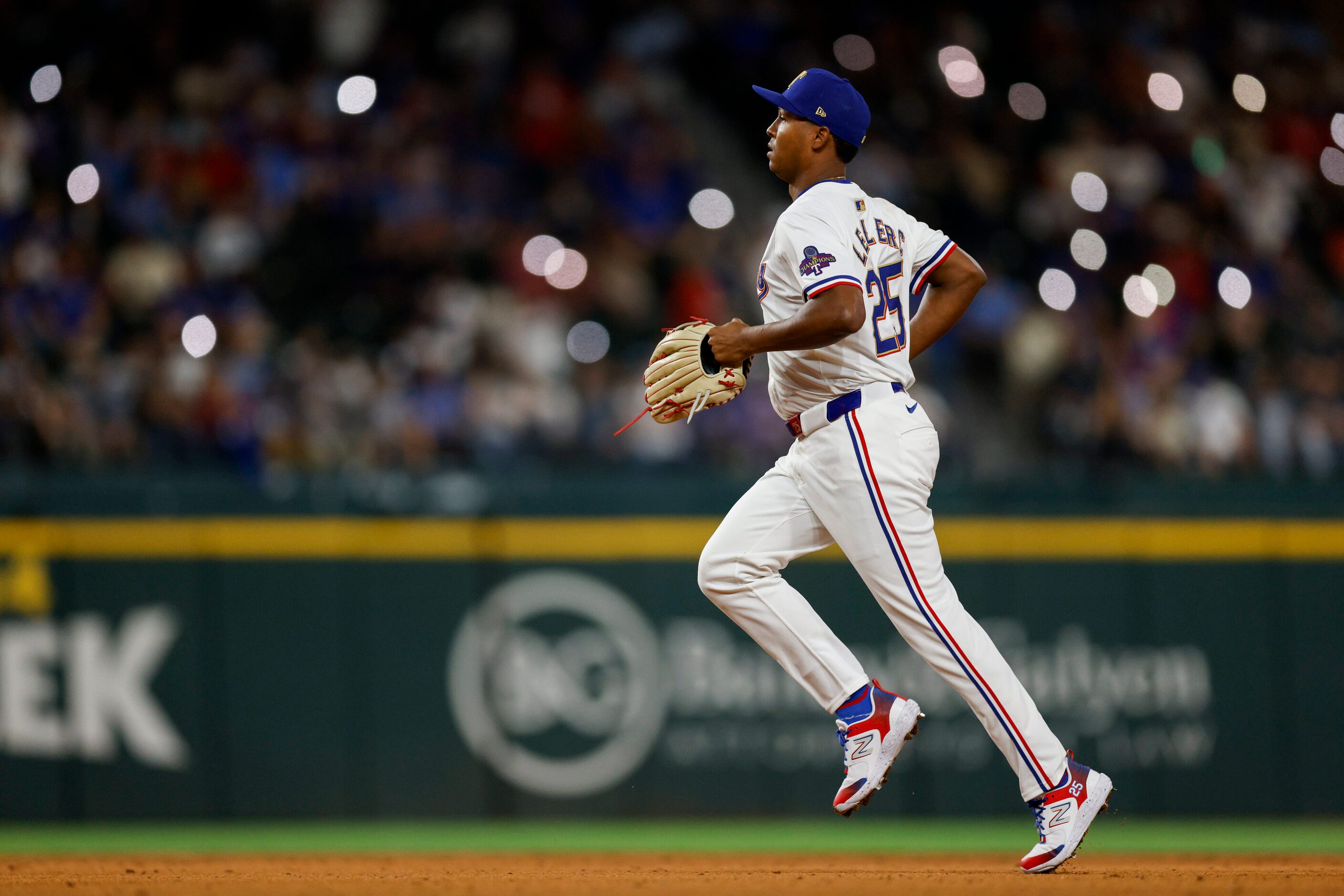 Texas Rangers relief pitcher Jose Leclerc (25) takes the field to pitch during the ninth...