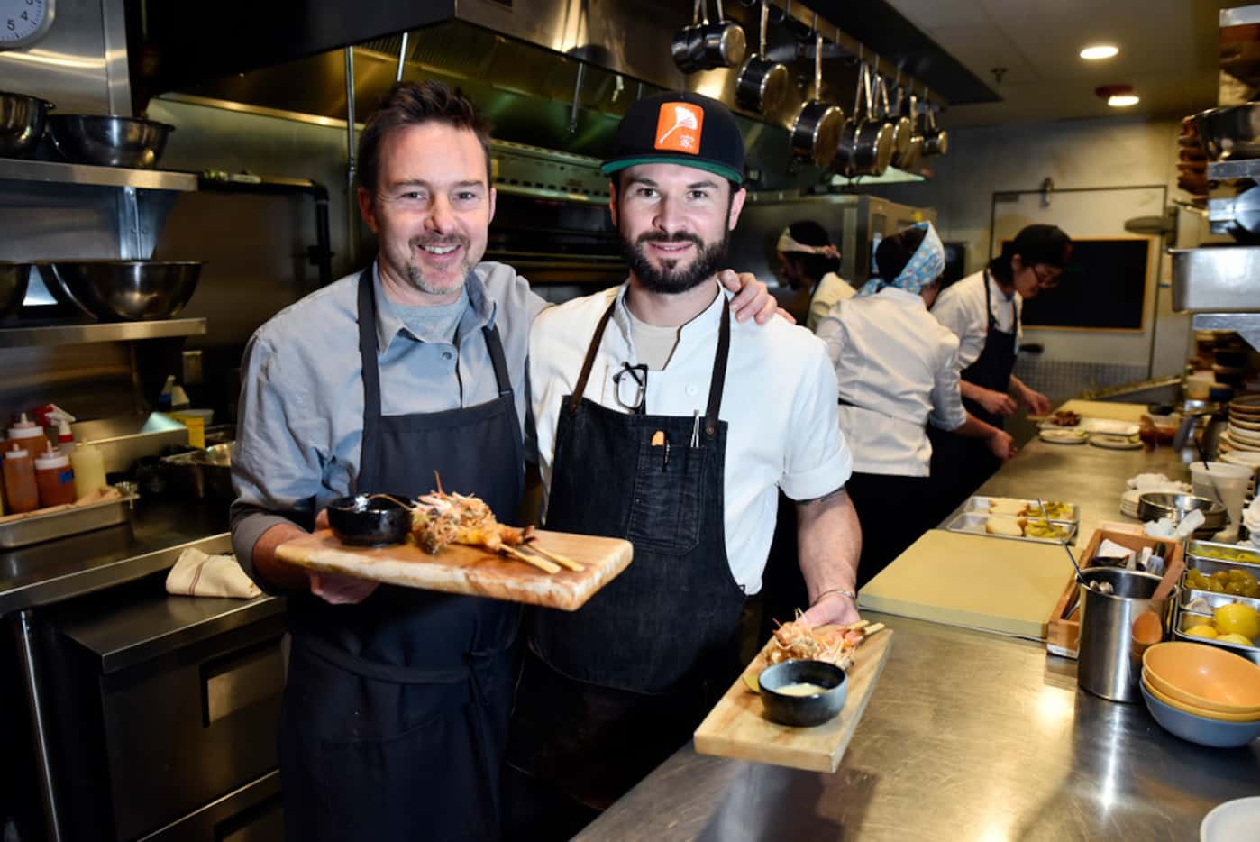 Uchi chef-partner Tyson Cole, left, and chef de cuisine Alex Astranti recently opened a new...
