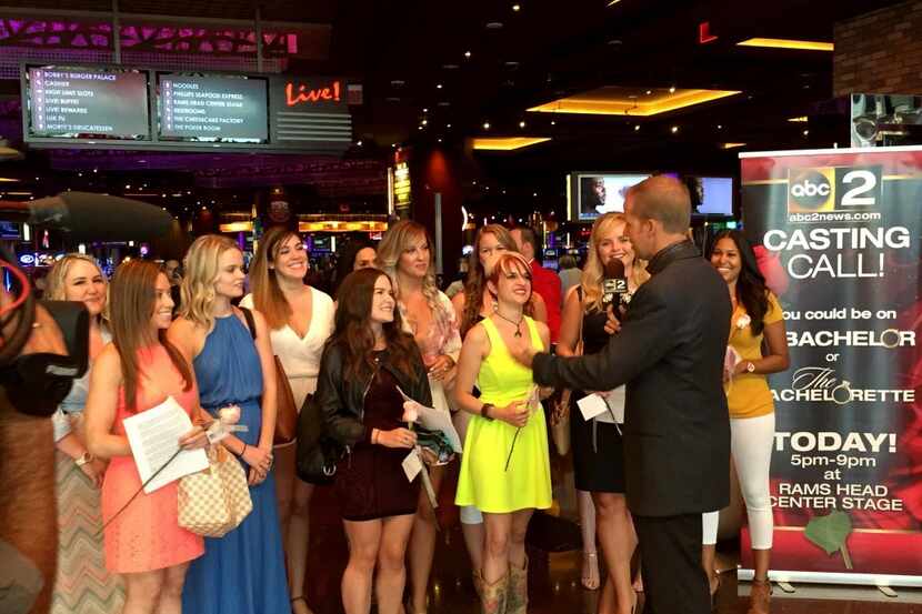 ABC2 meterologist Wyatt Everhart interviews "Bachelor" hopefuls at a casting call in...