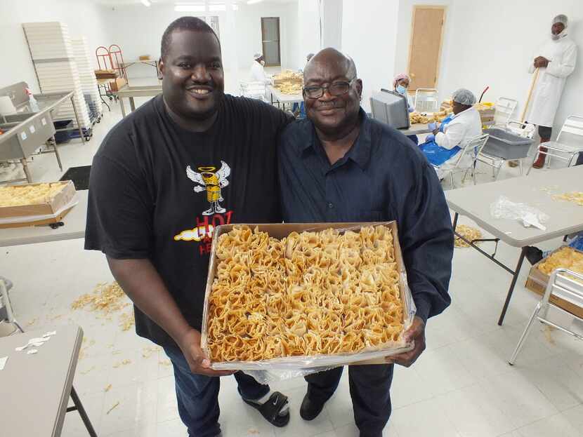 Aaron Harmon (left) and his father, Willie, run Hot Tamale Heaven, a restaurant and...
