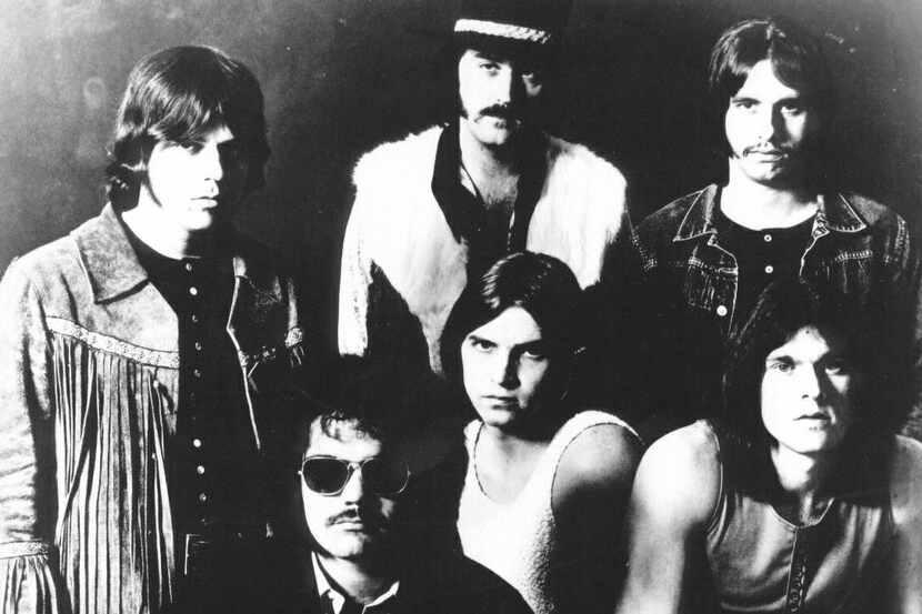 Members of the 70s classic hard rock band Bloodrock, standing from left: Ed Grundy, Lee...