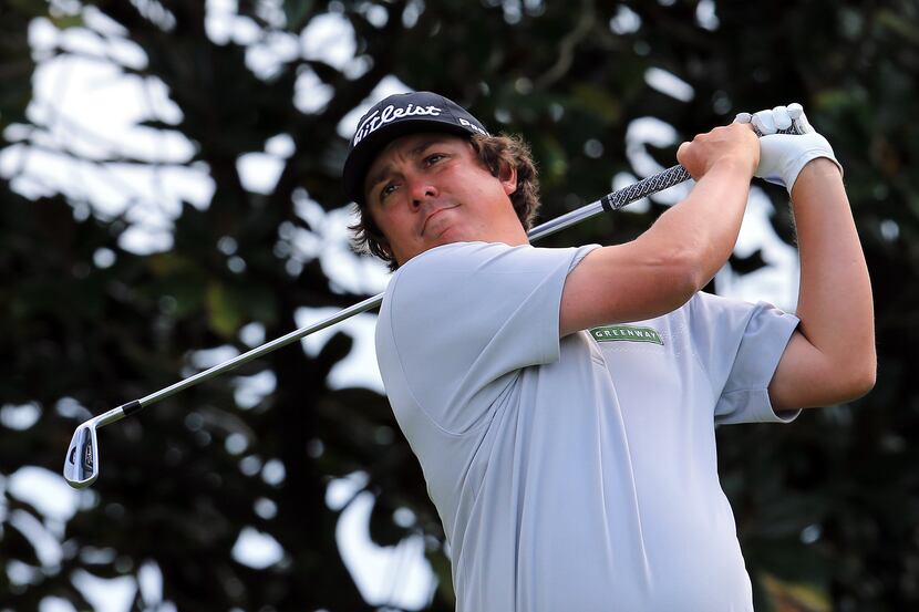 ORLANDO, FL - MARCH 22:  Jason Dufner of the United States plays his tee shot at the par 3,...
