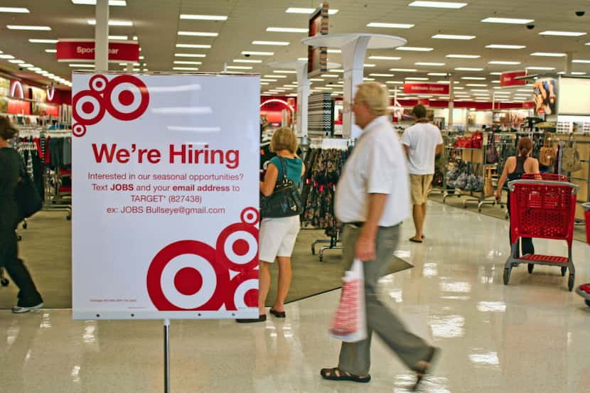 Target is among the companies using mobile technology to recruit seasonal help. Signs inside...