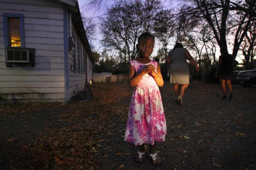 Raynasja Smith 4, leaves after services at the Liberty in Christ House of God Church. The...