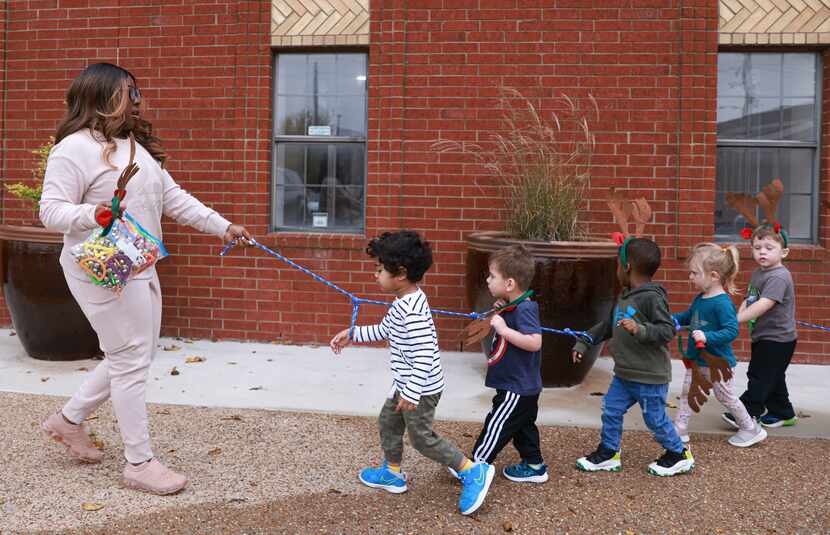 Allison Jackson, 25, leads her class of toddlers at the Connect: KIDS Learning Center in...