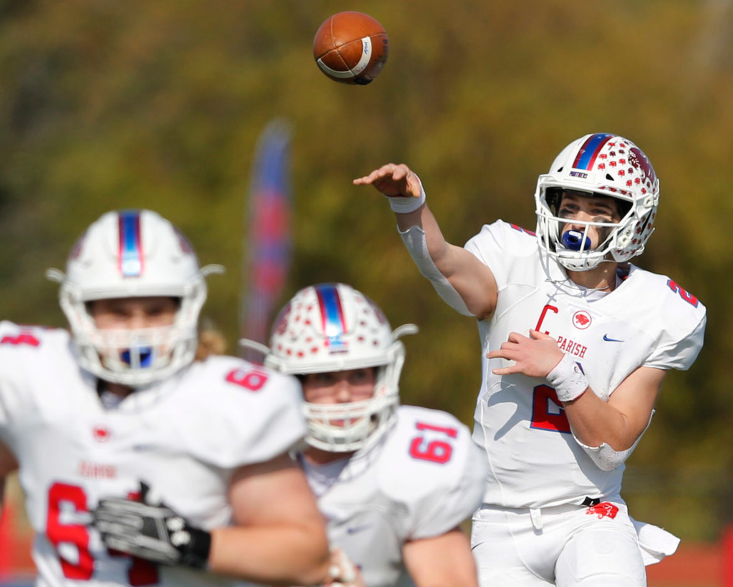 Parish Episcopal's Preston Stone (2) attempts a pass in a game against Plano John Paul II...