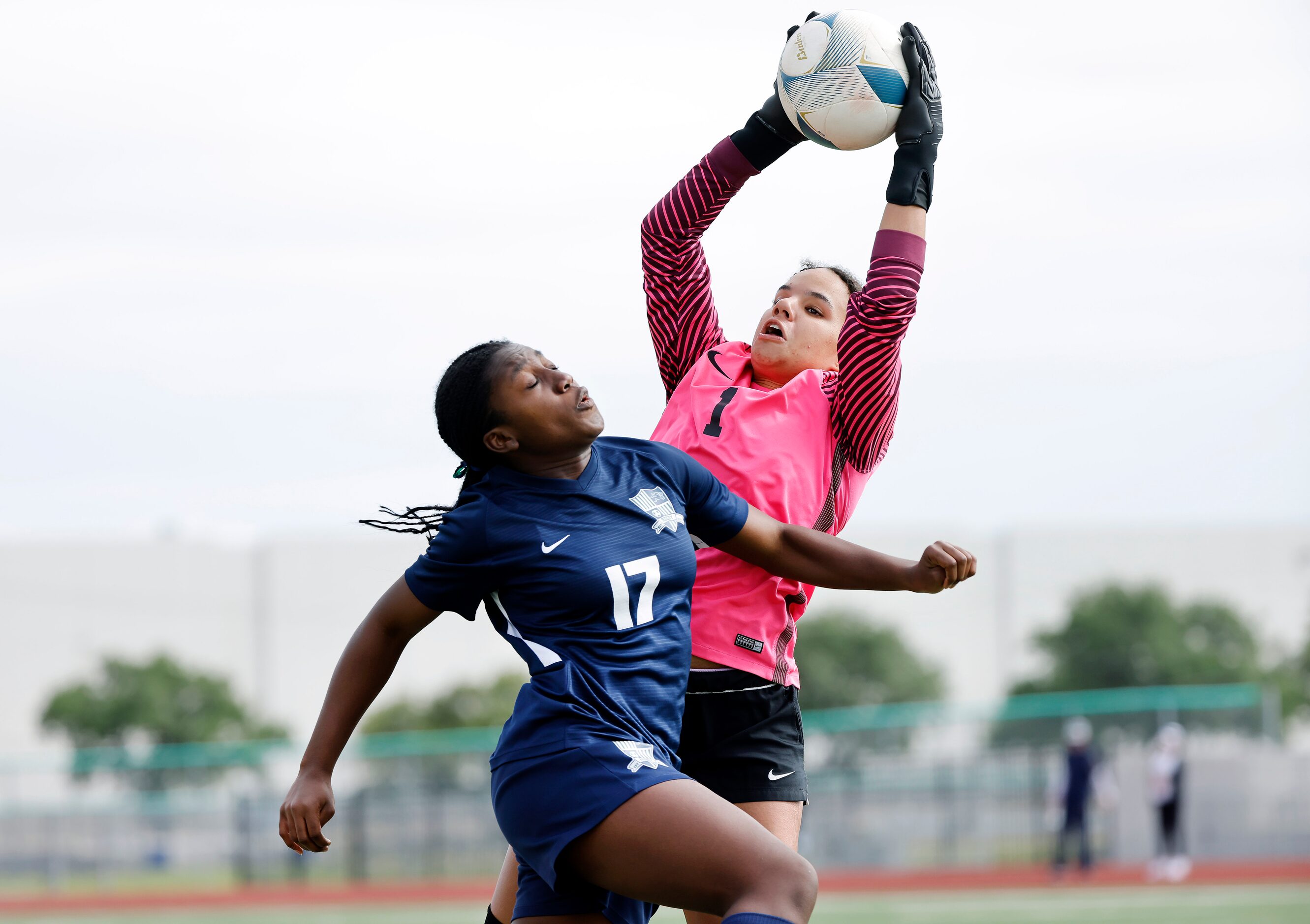 Frisco goalkeeper Ariana Anderson snares a first half shot as Frisco Reedy’s Dezeriah Scott...