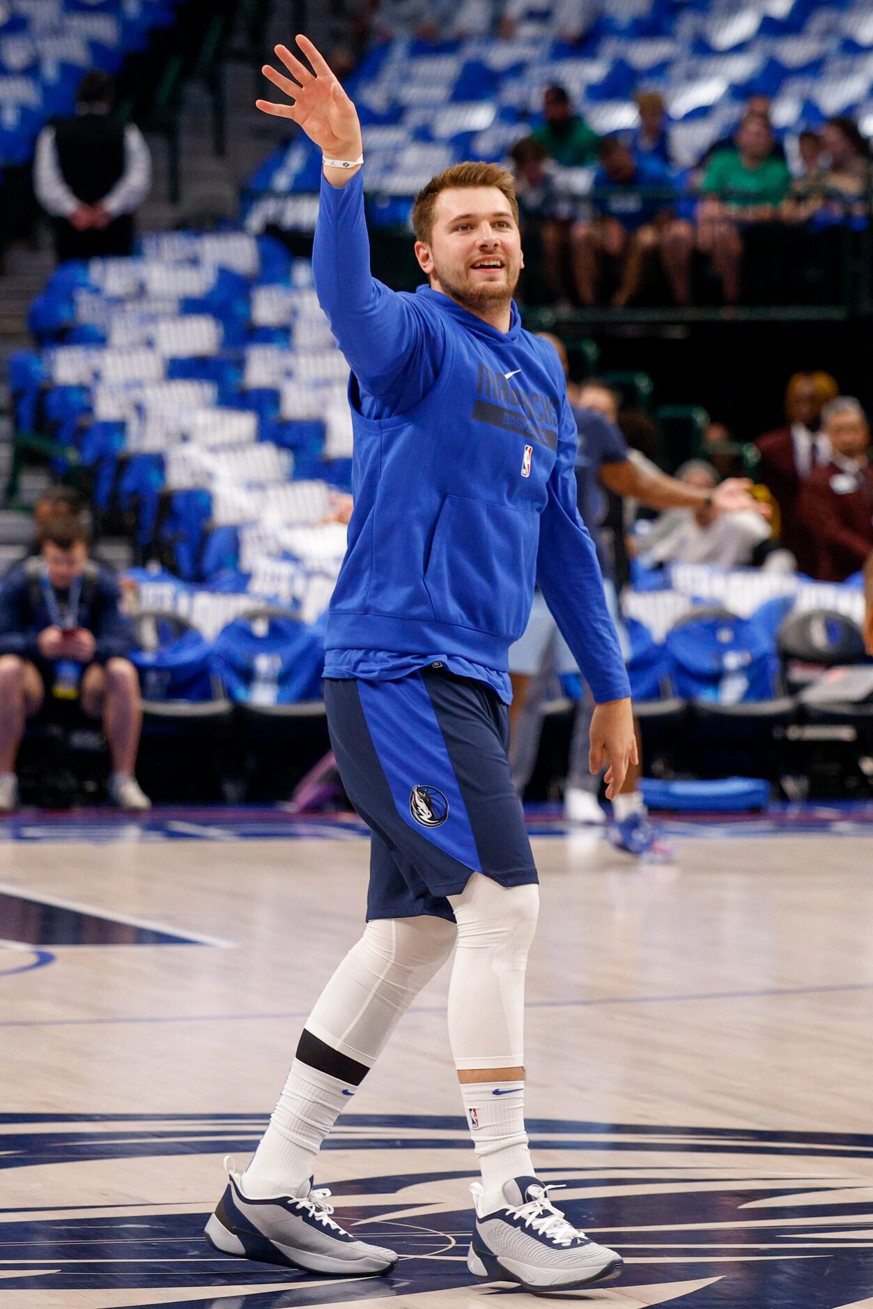 Dallas Mavericks guard Luka Doncic (77) watches his shot from half-court before the Mavs...