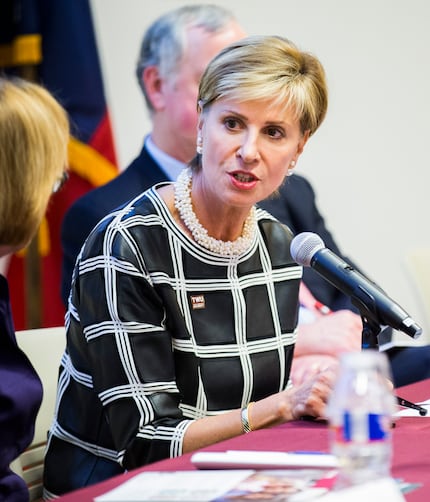 Carine Feyten, chancellor and president of Texas Woman's University, speaks on a panel as...