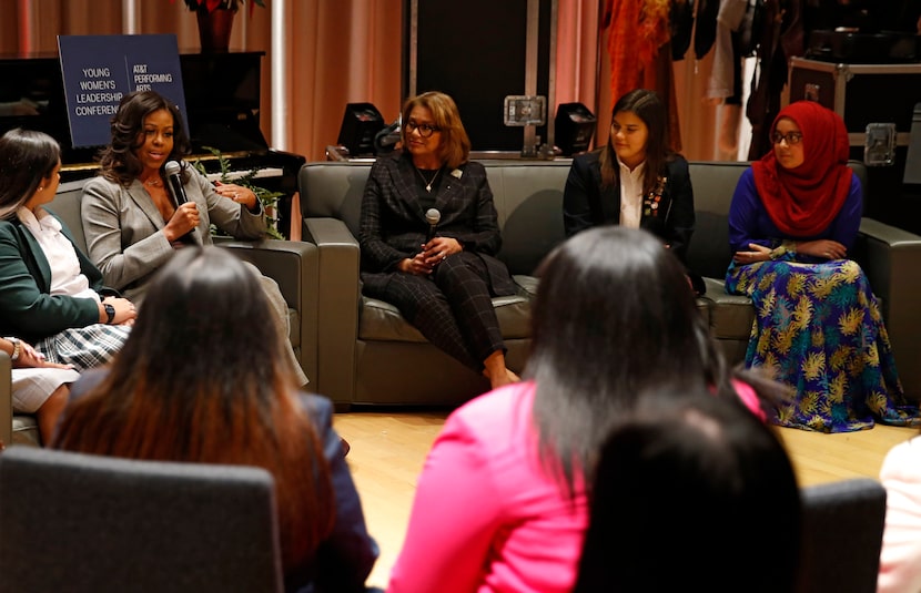 Iman Ikram (far right) of Qalam Collegiate Academy listened as former
first lady Michelle...