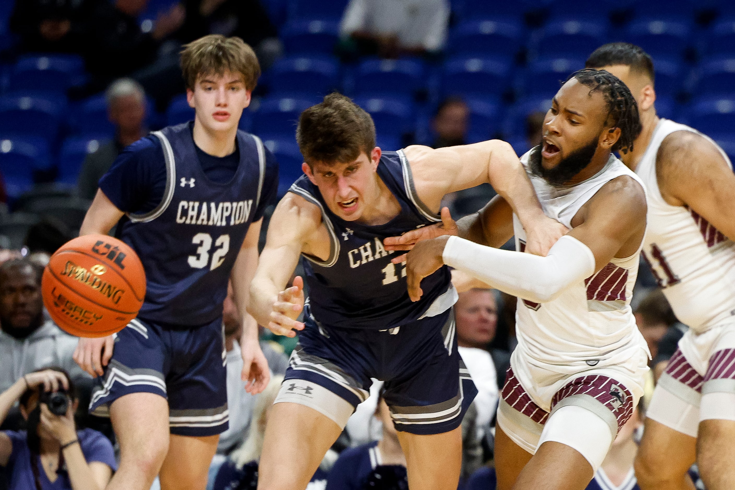 Mansfield Timberview guard Jared Washington (5) and Boerne Champion guard Braxton Burdick...