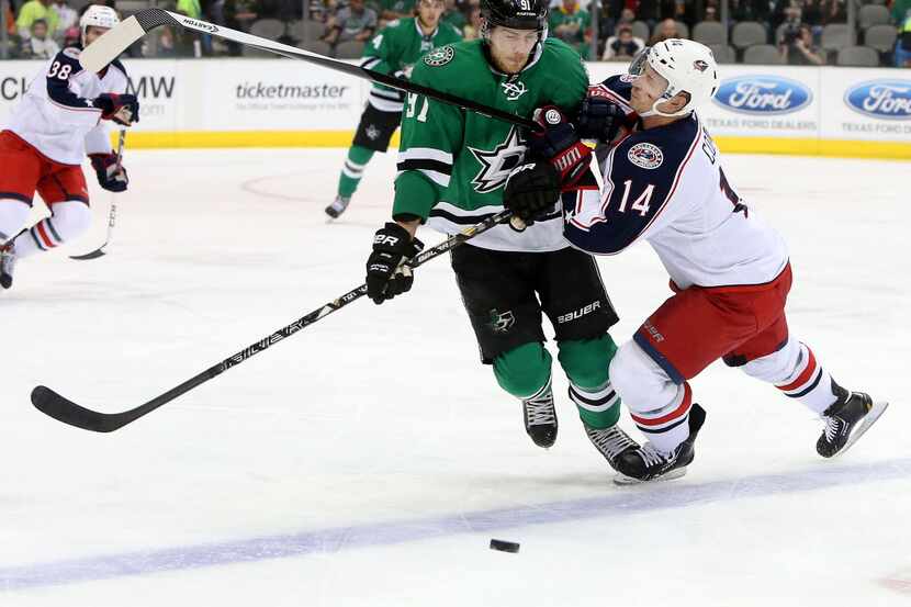 Columbus Blue Jackets left wing Blake Comeau (14) collides with Dallas Stars center Tyler...