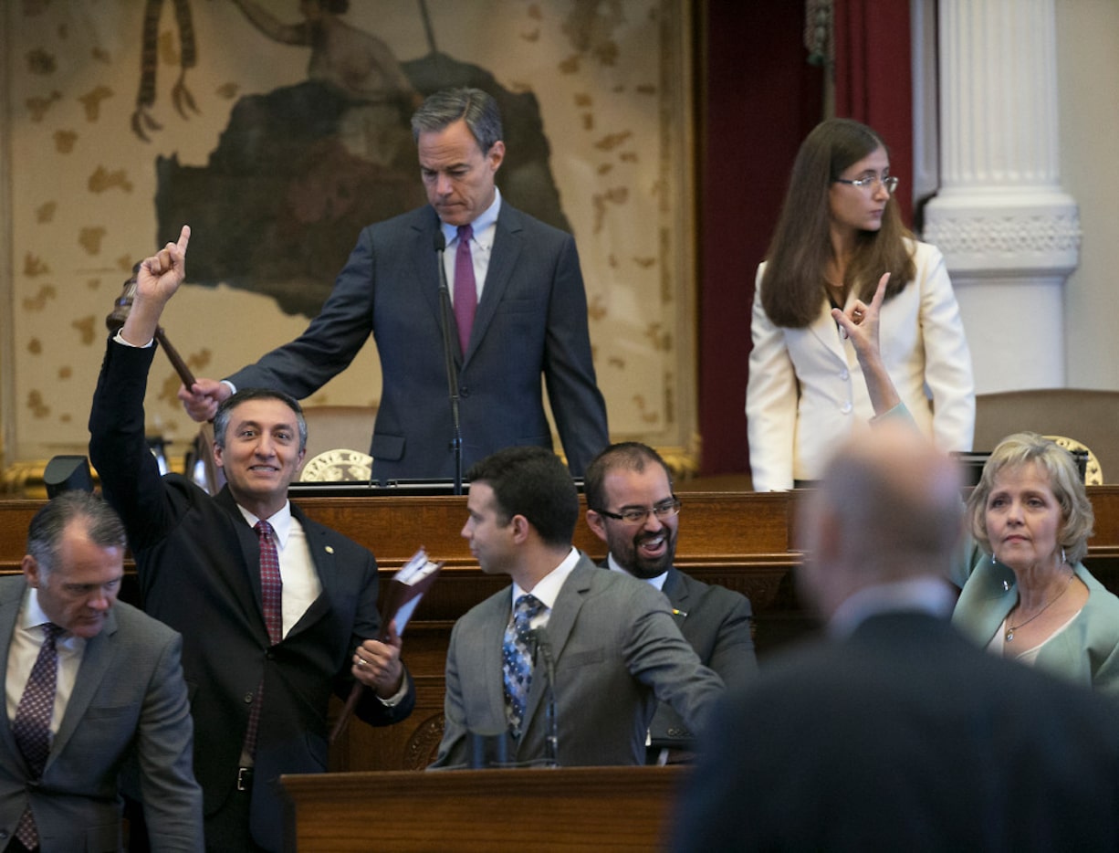 House Speaker Joe Straus keeps order on the House floor Thursday, July 27, 2017 in Austin as...