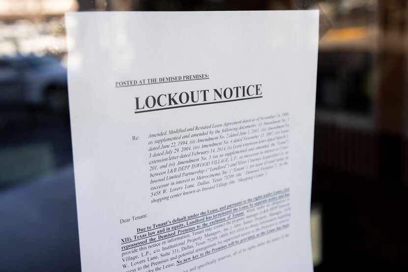 A lockout notice on the door of the Landmark's Inwood Theatre on Friday, Feb. 23, 2024, in...