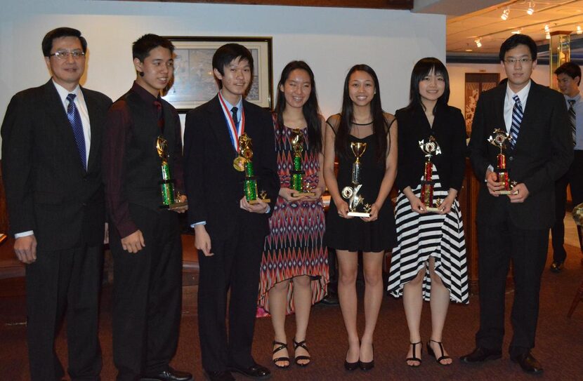 
Roger Hung (left) presented the Outstanding Service Award to (from left) Andrew Feng, Brian...