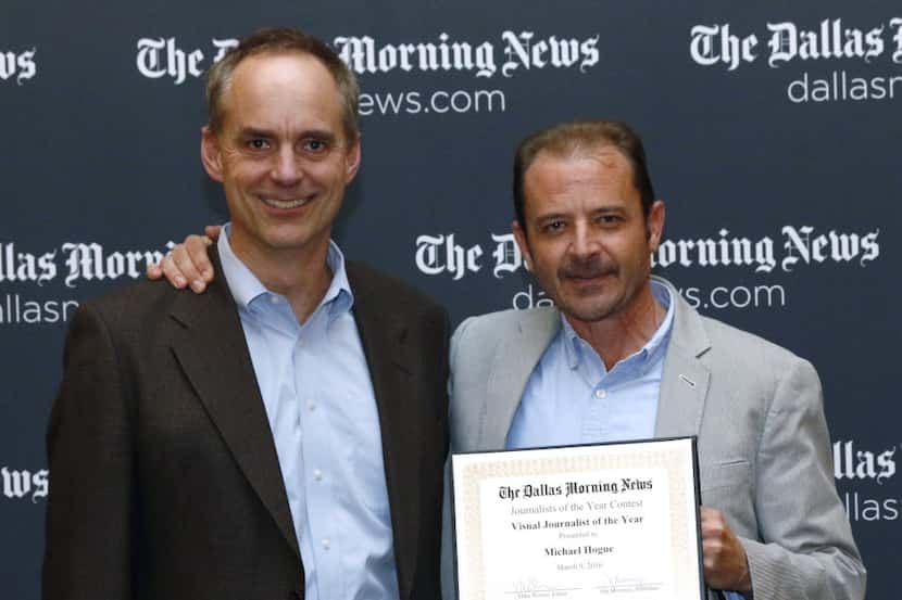 The Dallas Morning News Visual Journalist of the Year winner, Michael Hogue, right, with...