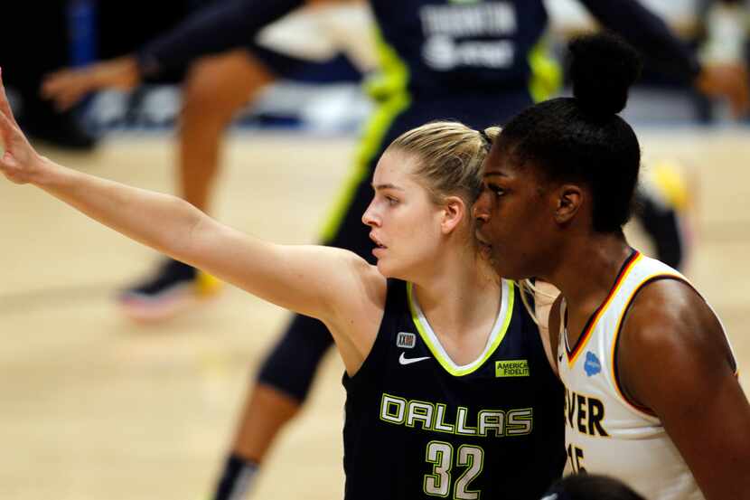 Dallas Wings center Bella Alarie (32) defends inside against Indiana Fever center Teaira...