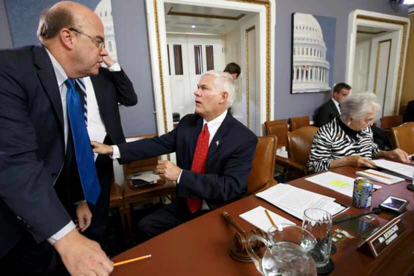 
Democratic Rep. James McGovern of Massachusetts (left) speaks with GOP House Rules...