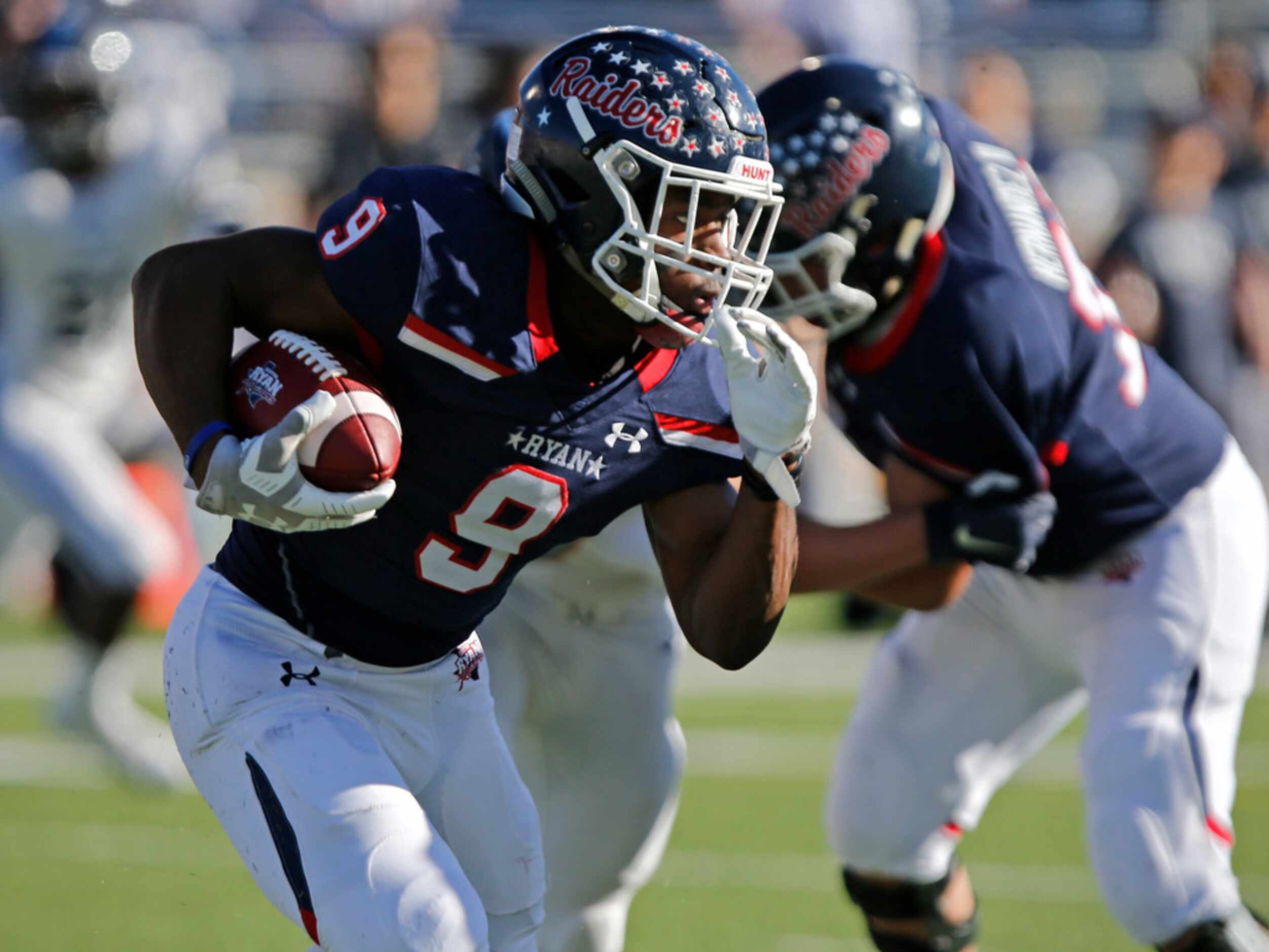 Denton Ryan High School running back Emani Bailey (9) carries the football during the first...