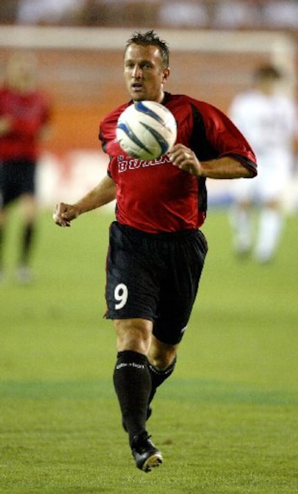 MIAMI - MARCH 5:  Jason Kreis #9 of the Dallas Burn makes his way downfield against the New...