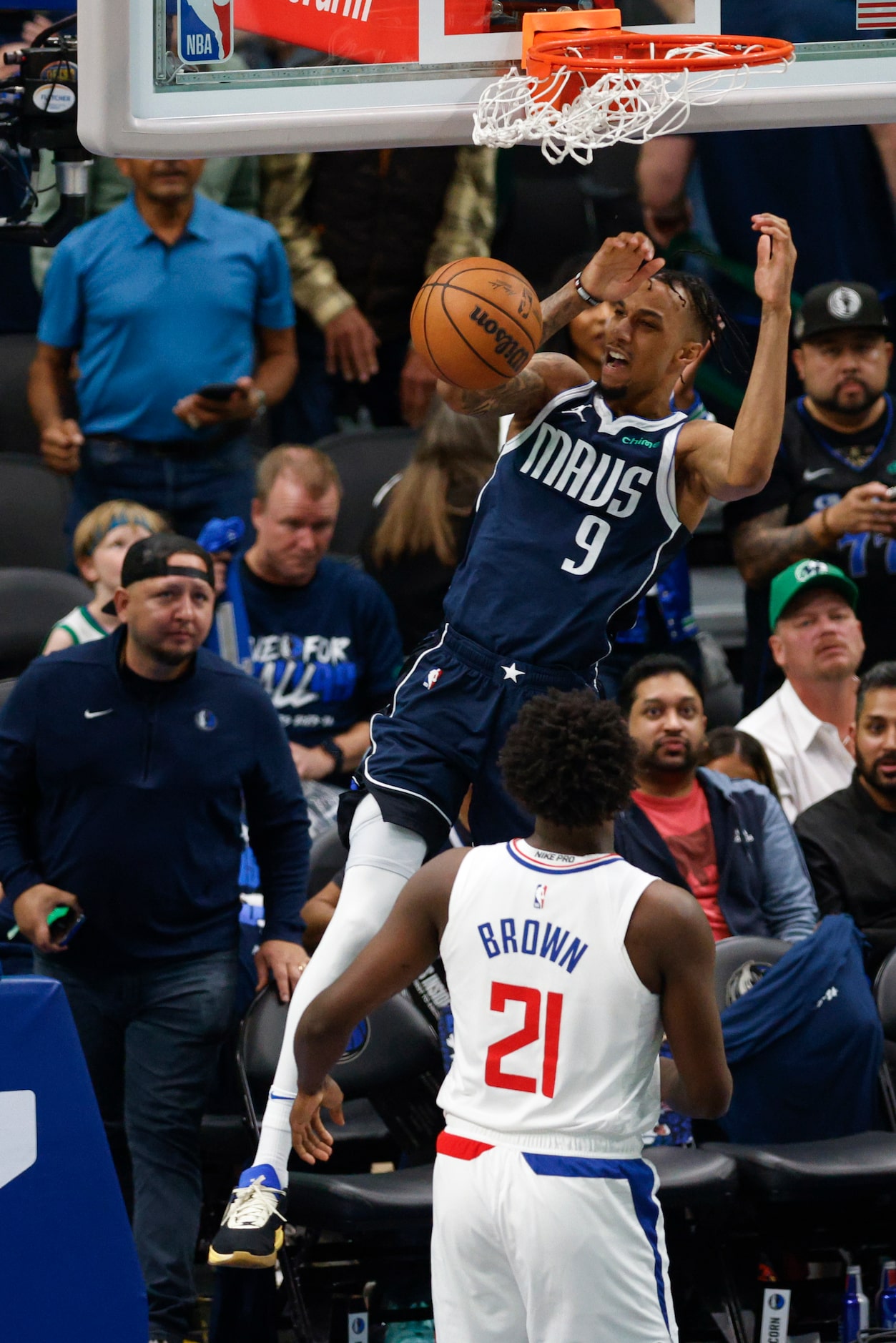 Dallas Mavericks guard A.J. Lawson (9) dunks the ball against LA Clippers guard Kobe Brown...