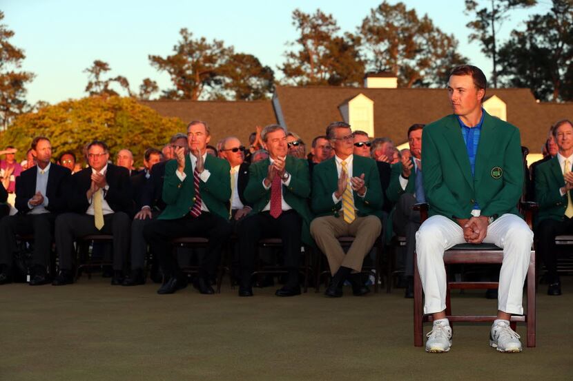 AUGUSTA, GEORGIA - APRIL 10:  Jordan Spieth of the United States reacts after presenting...