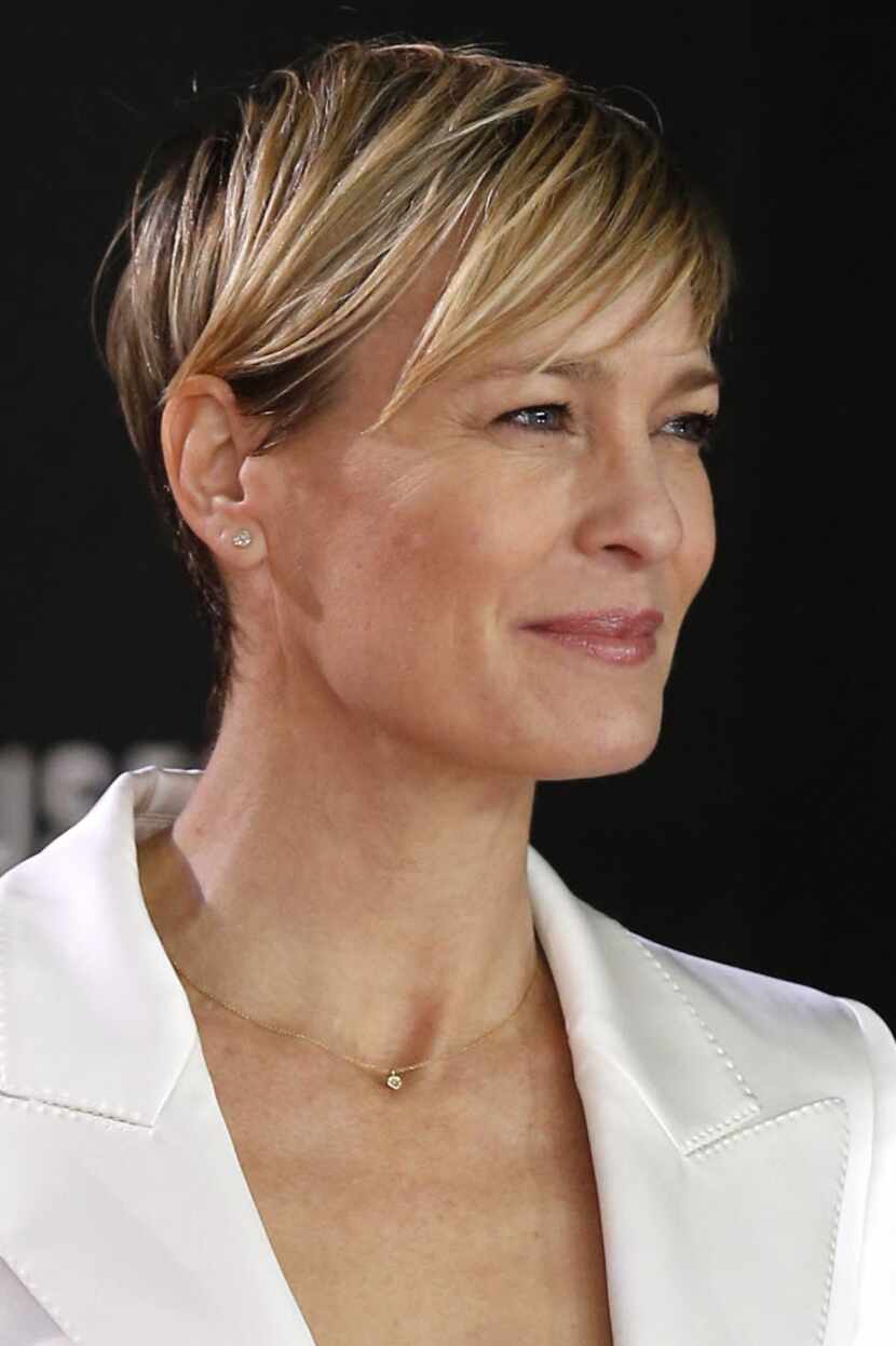 US actress Robin Wright poses for photographers on the red carpet ahead of the world...