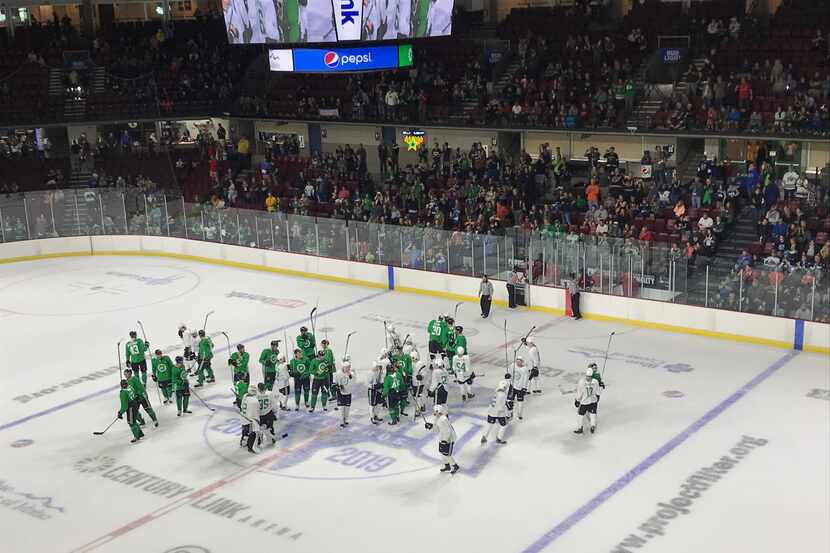 The Dallas Stars salute the fans at CenturyLink Arena in Boise, Idaho, after a training camp...