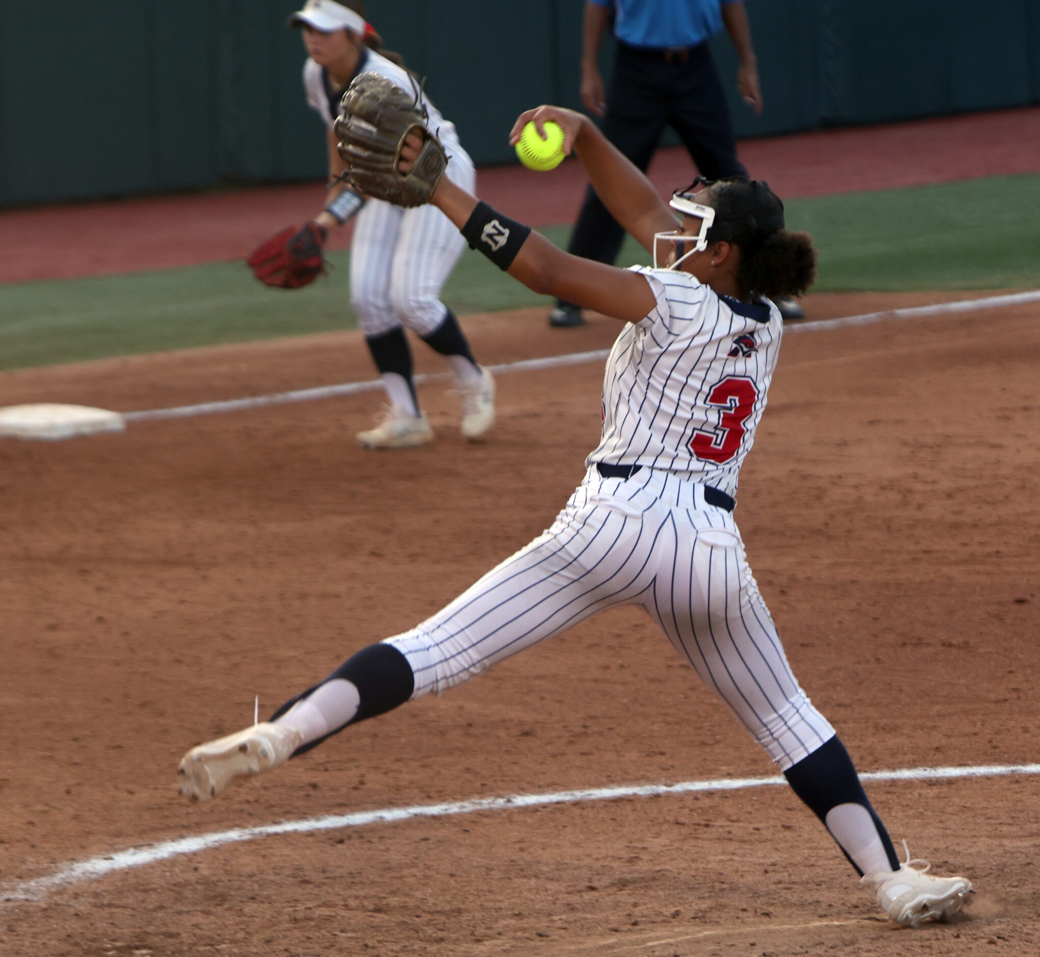 Aubrey pitcher Mya Cherry (3) delivers a pitch during the top of the 2nd inning of play...