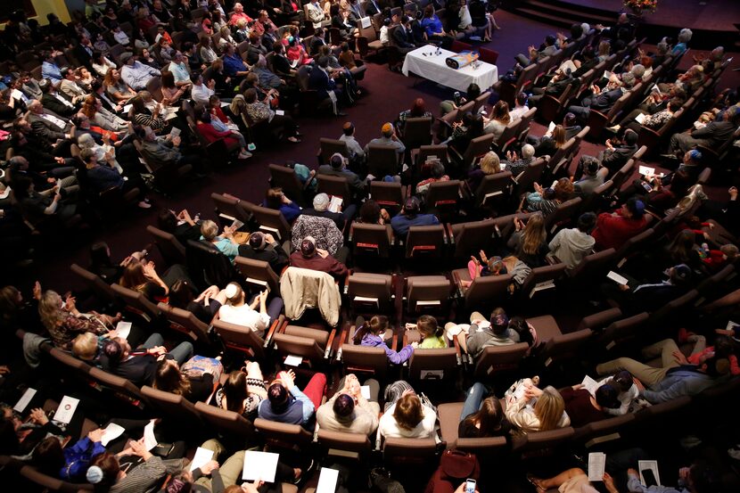 The Anshai Torah congregation in Plano gathers to celebrate the arrival of a torah...