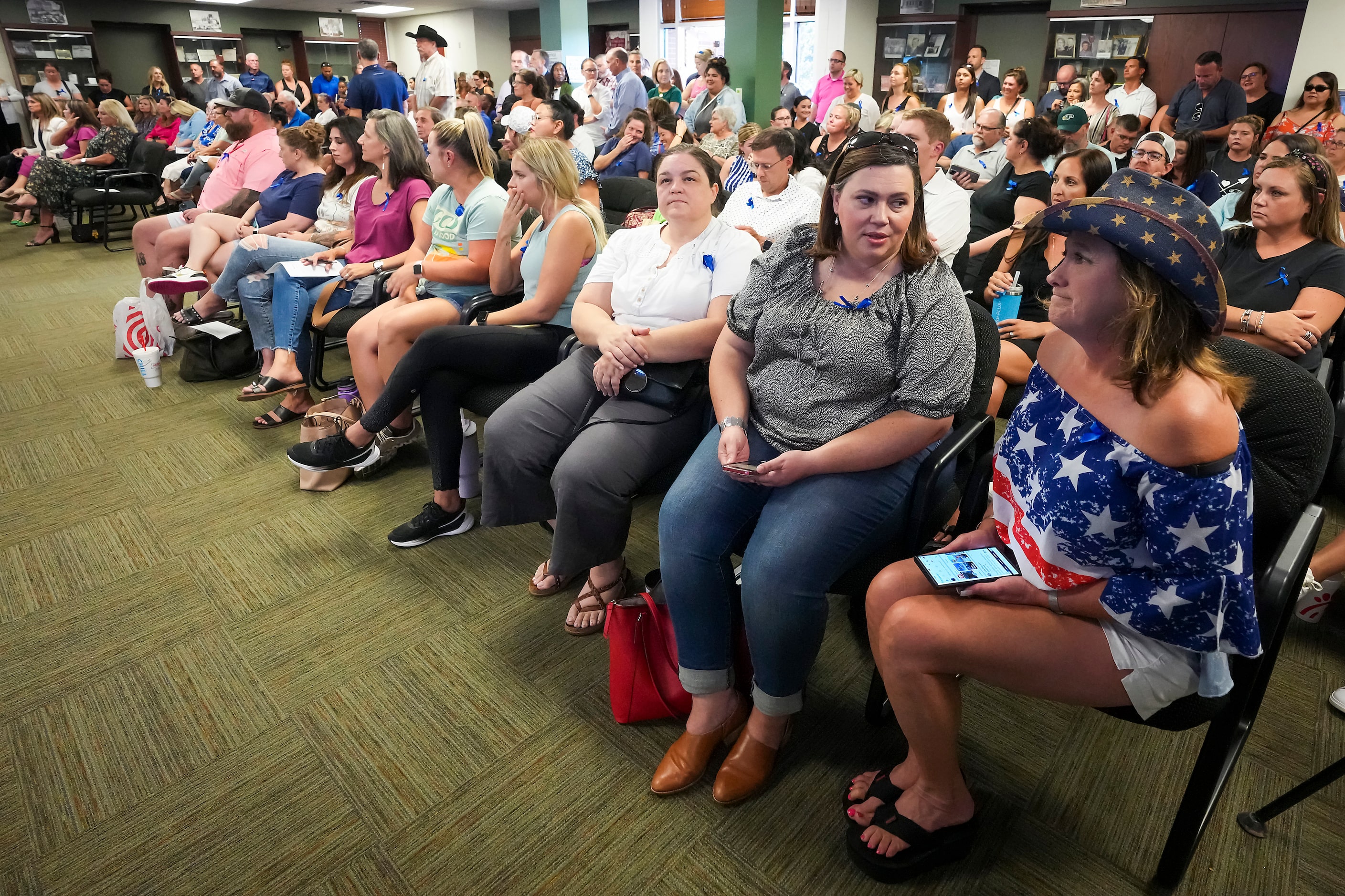 A standing room only crowd fill the board room for a Prosper ISD board meeting on Monday,...