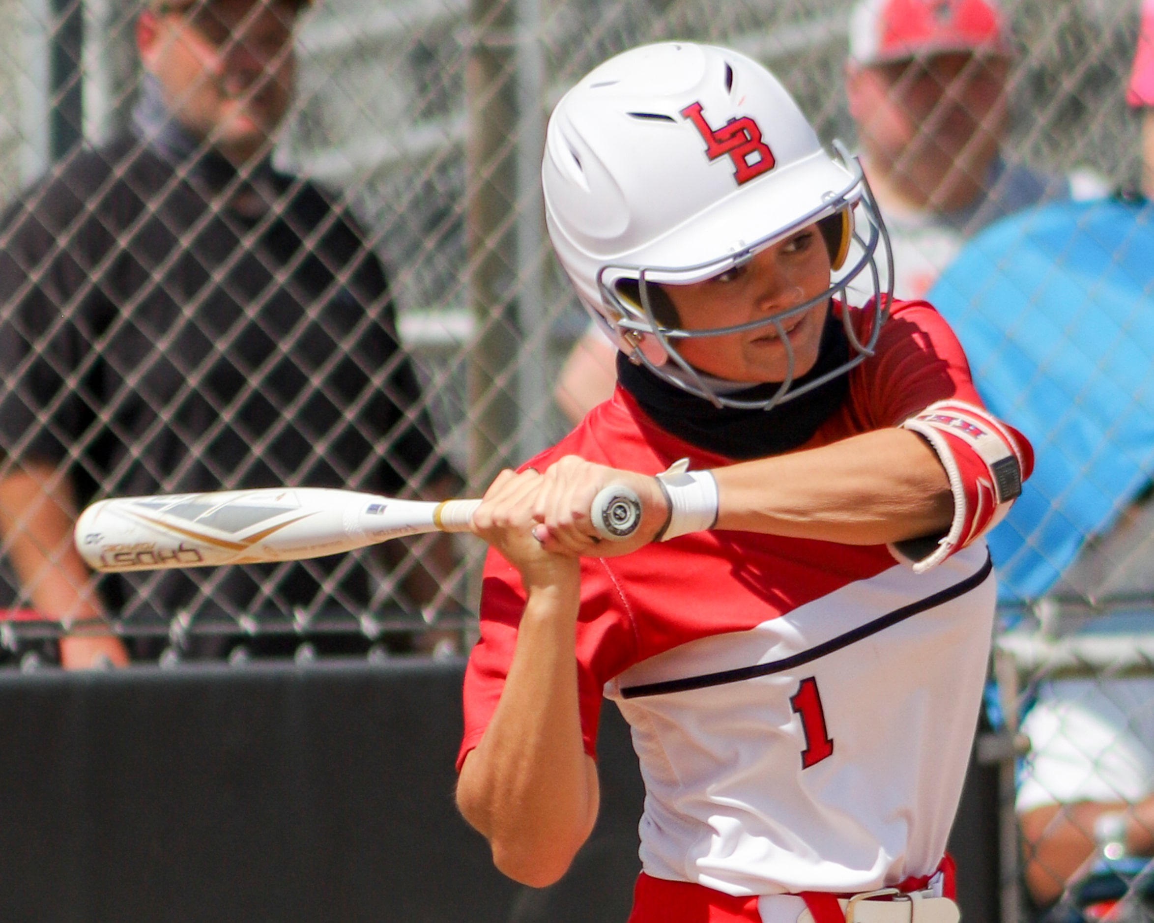 Mansfield Legacy third baseman Kelby Robbins (1) swings for a pitch during a softball Class...