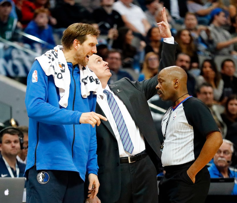 Dallas Mavericks forward Dirk Nowitzki (41) and Dallas Mavericks head coach Rick Carlisle...