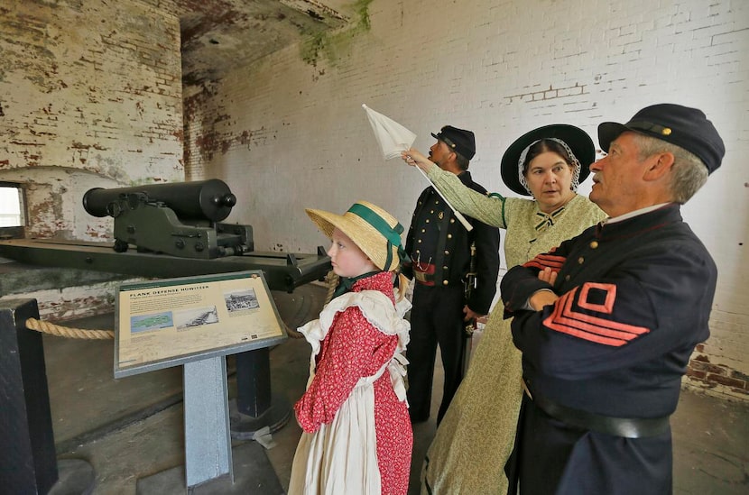 
Members of the Civil War Friends of Alcatraz visit the guardhouse, which needed to be...