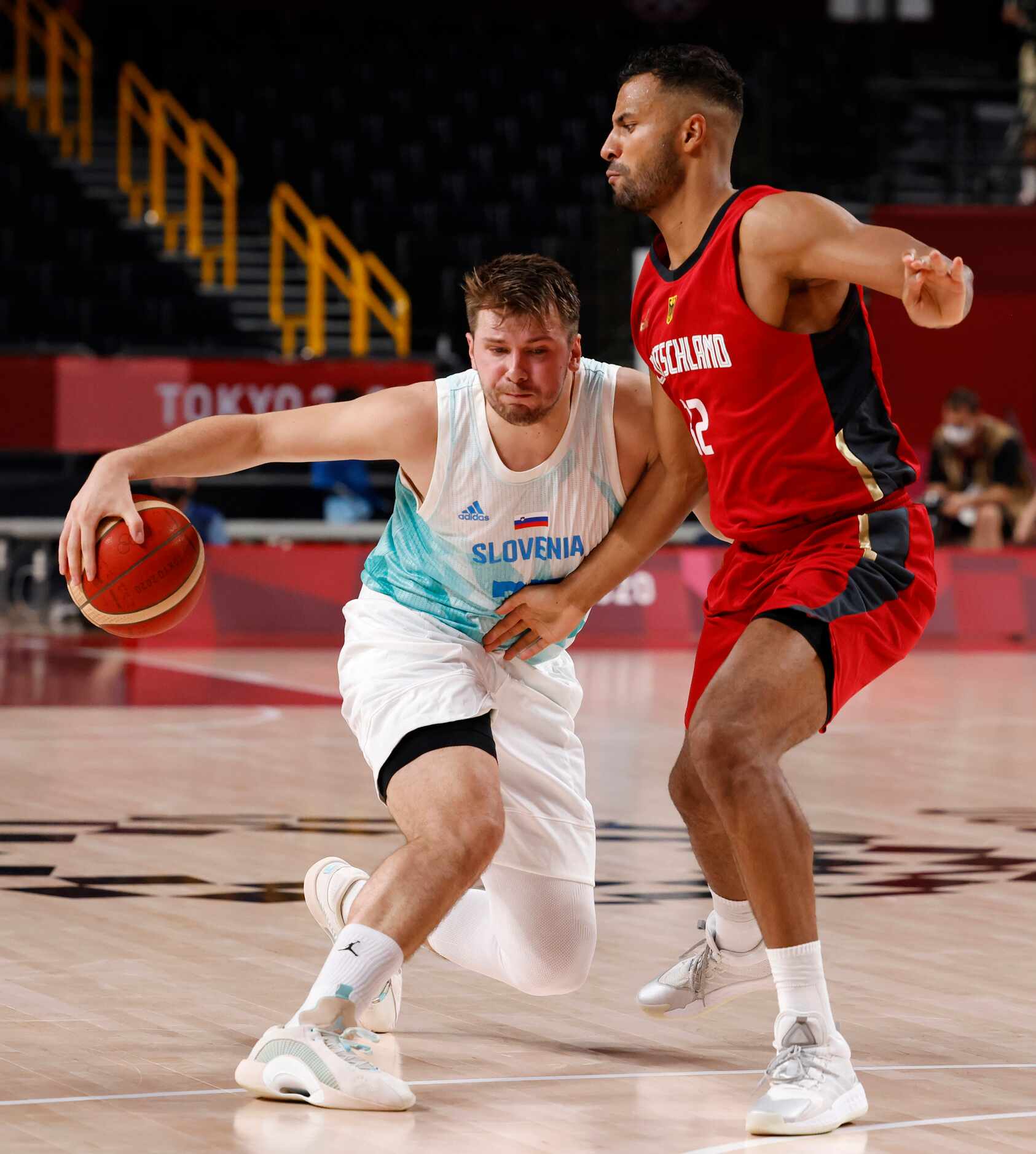 Slovenia’s Luka Doncic (77) drives on Germany’s 
during the second half of play of a quarter...