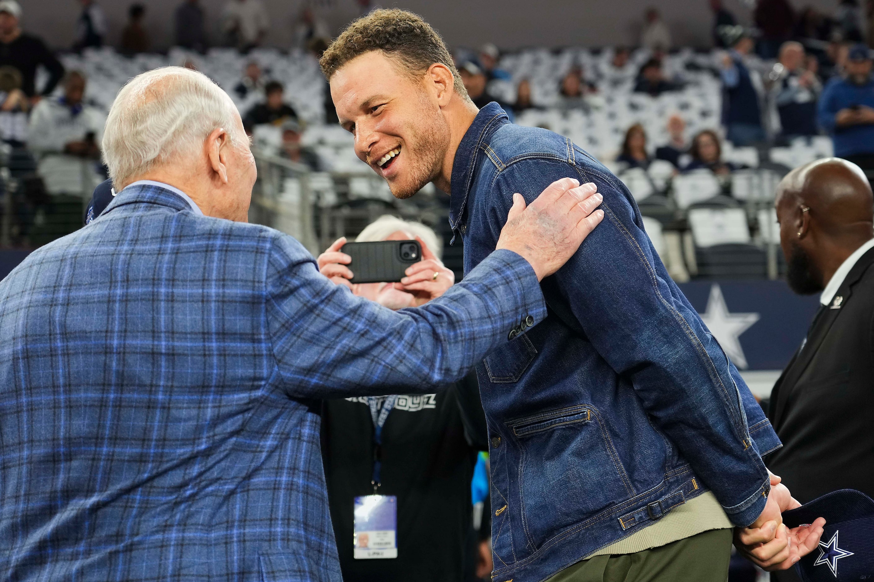 Former NBA player Blake Griffin (center) talks former Dallas Cowboys and Oklahoma head coach...