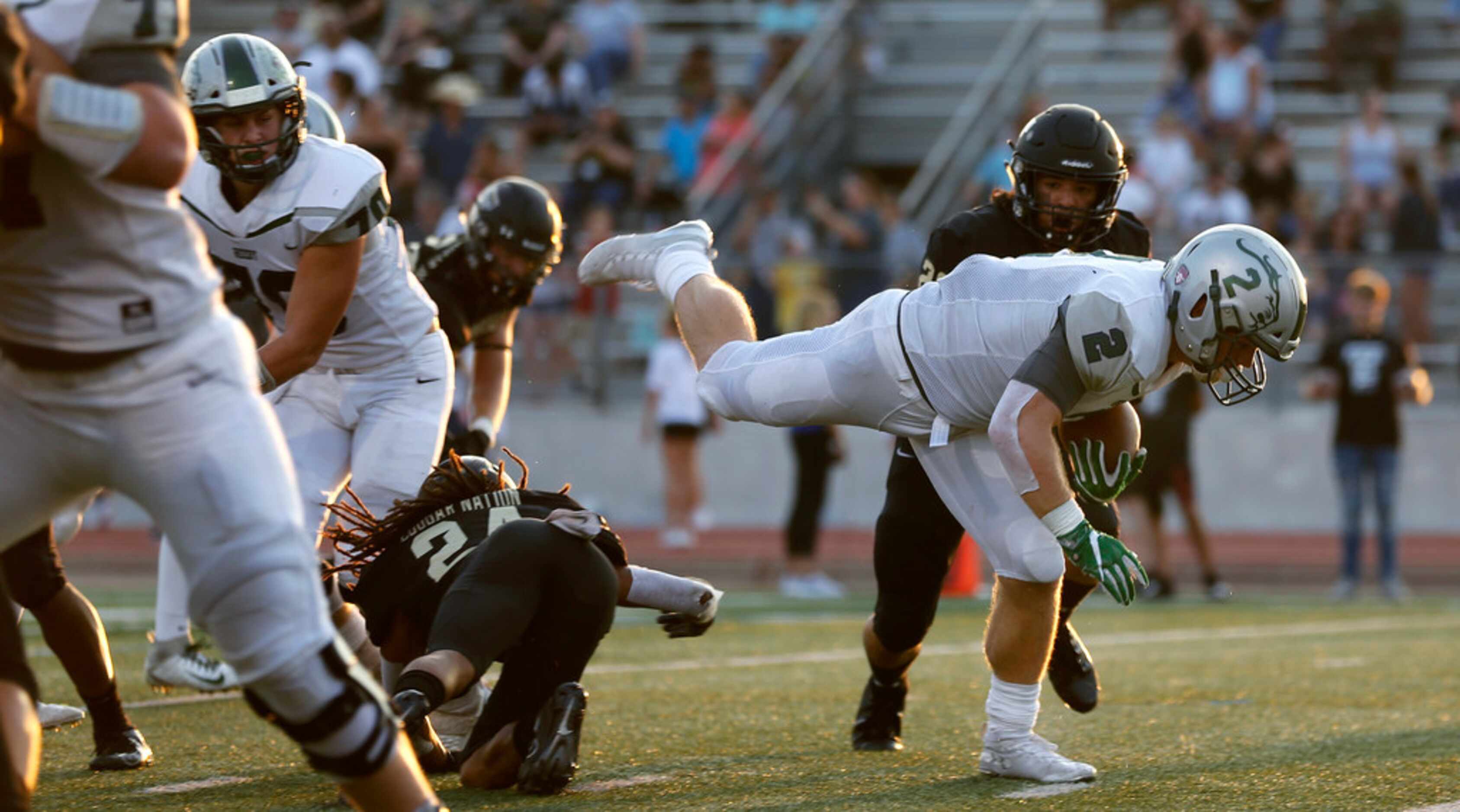 Frisco Reedy linebacker Will Harbour (2) stumbles across the goal line for a first quarter...