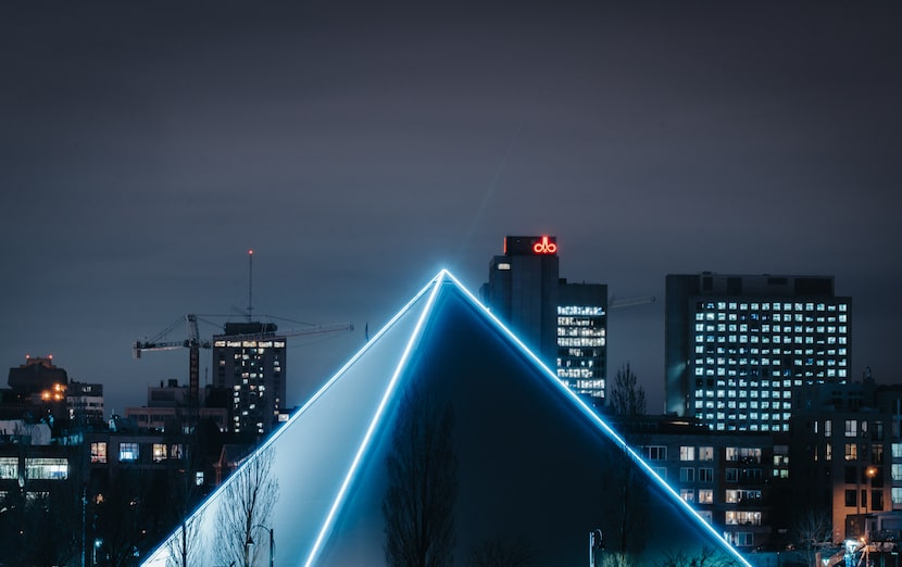 PY1, a neon-lit, pyramid-shaped entertainment venue, is in Parking Lot F of Globe Life Park...