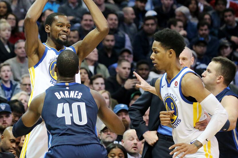 Golden State Warriors forward Kevin Durant (35) attempts to move the ball in the third...