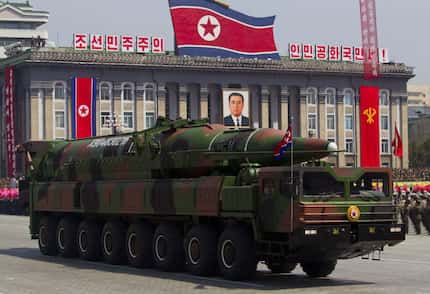 In this Sunday, April 15, 2012 file photo, a North Korean vehicle carrying a missile passes...
