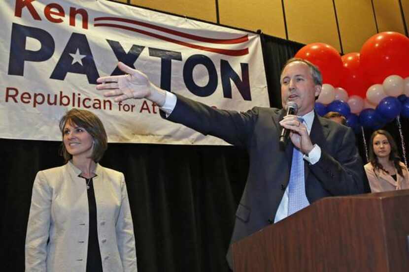 
State Sen. Ken Paxton and his wife, Angela, greeted supporters Tuesday at Embassy Suites in...