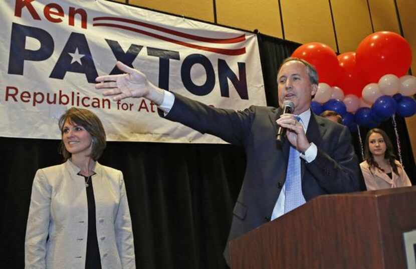 
State Sen. Ken Paxton and his wife, Angela, greeted supporters Tuesday at Embassy Suites in...