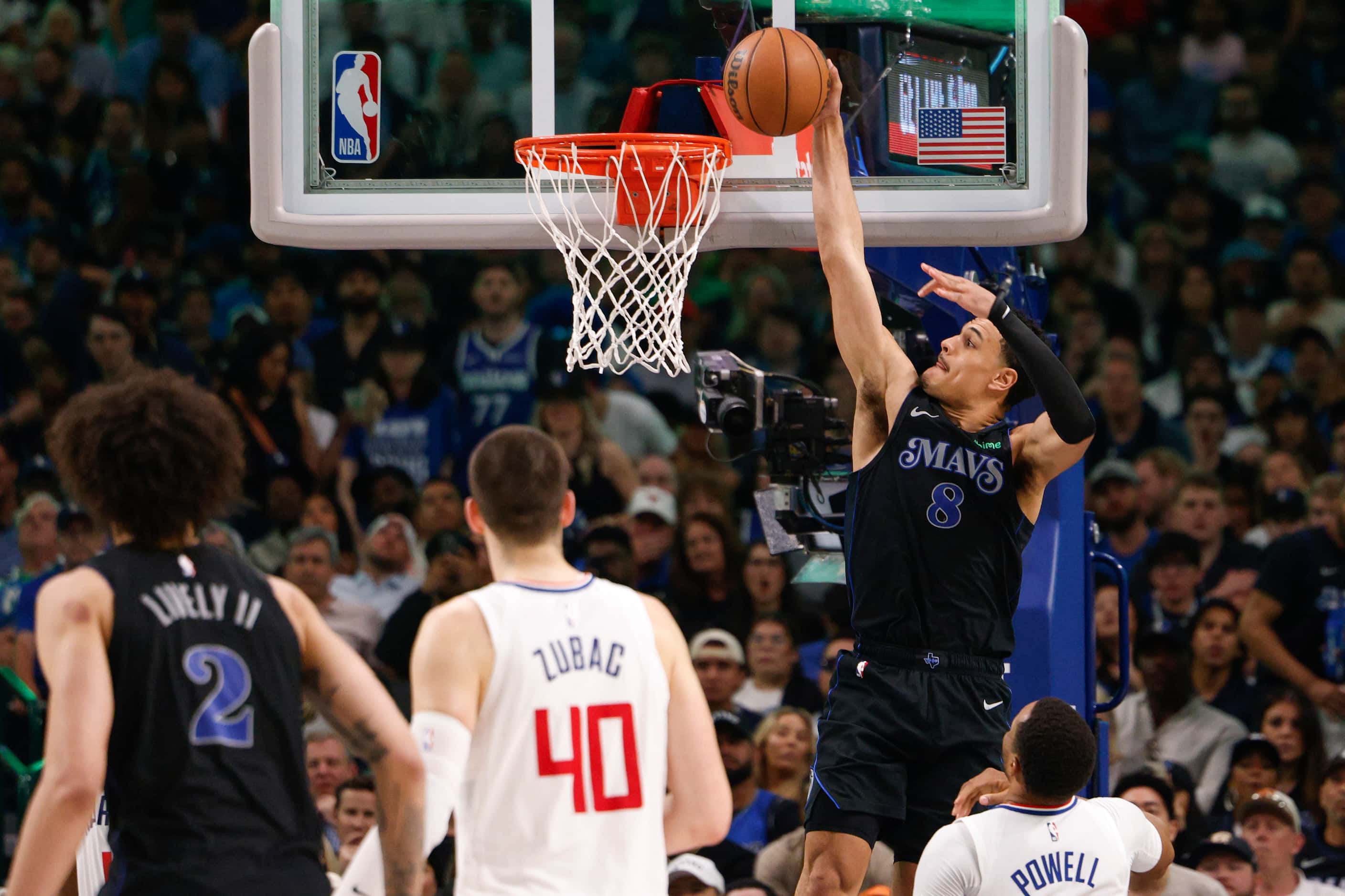 Dallas Mavericks guard Josh Green (8) dunks the ball during the first half of Game 6 of an...
