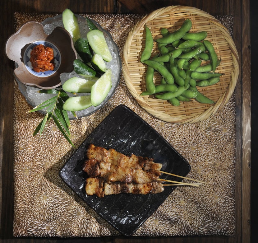 Izakaya snacks (clockwise from top left): moro Q; edamame; Kurobuta pork kushiyaki skewers  