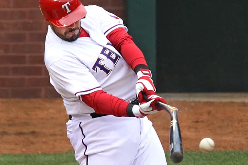  April 10, 2013--Texas catcher Geovanny Soto breaks his bat as he lines out to left fielder...